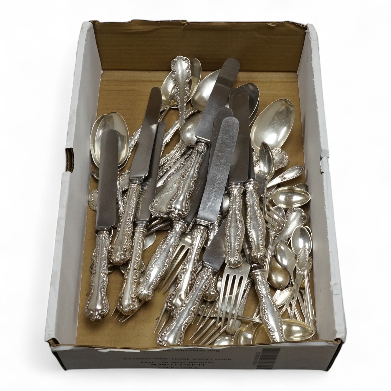 Ten 20th century sterling dessert spoons and ten matching dessert forks, together with eleven sterling handled steel dessert knives, eleven 800 standard white metal coffee spoons and a set of six 20th century silver coff